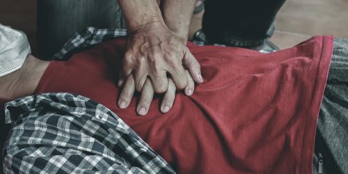 Young,Man,Is,Helping,His,Unconscious,Friend,And,Stop,Breathing Young,Man,Is,Helping,His,Unconscious,Friend,And,Stop,Breathing